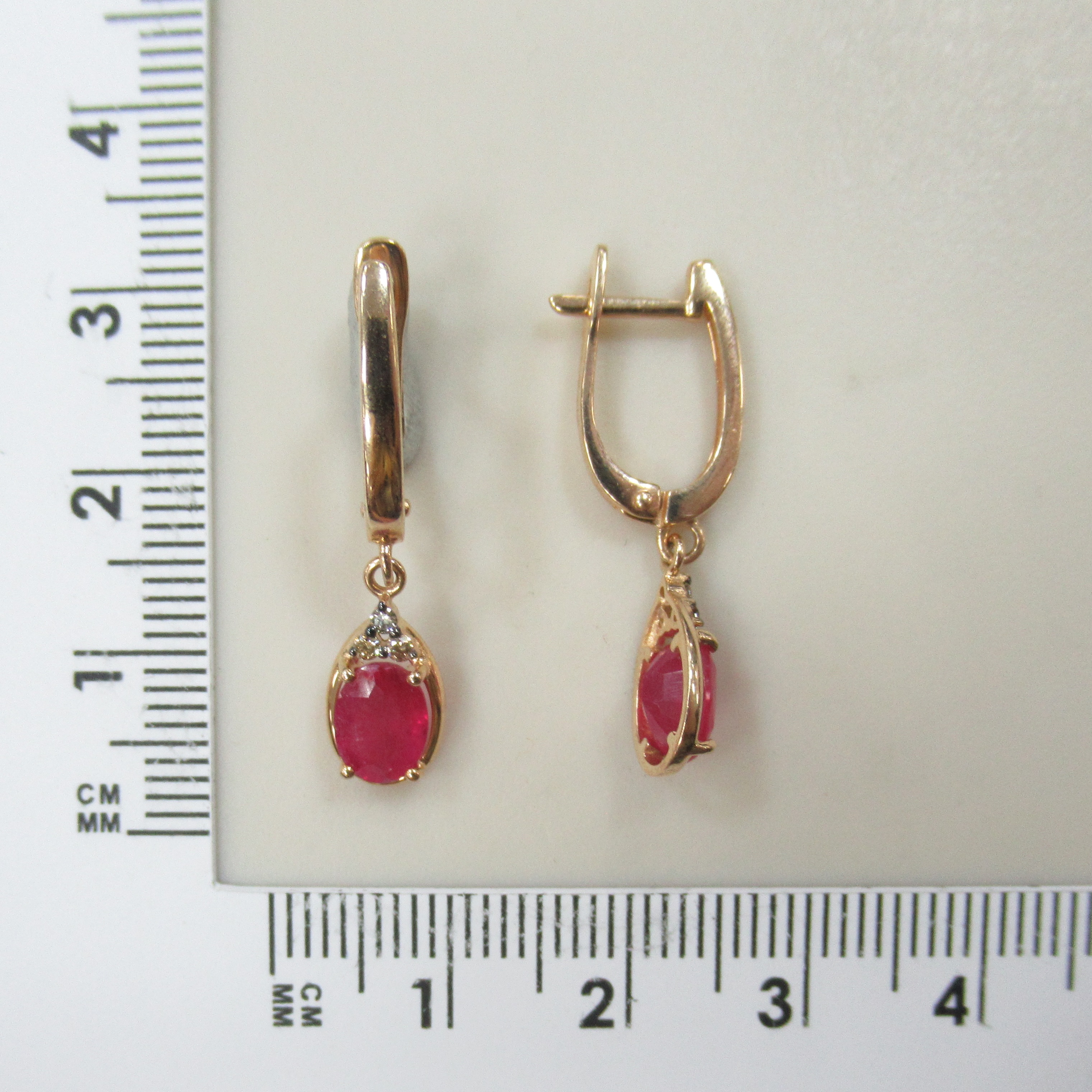 Серьги из золота с рубинами